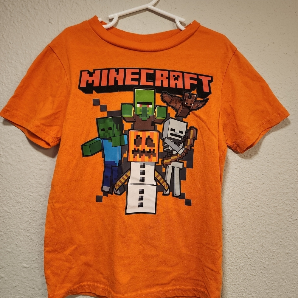 Vibrant Orange Short Sleeve Tees with Pixelated Graphics